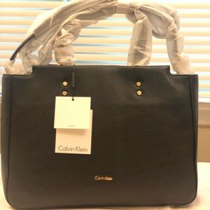 Calvin Klein’s L Doreen black leather